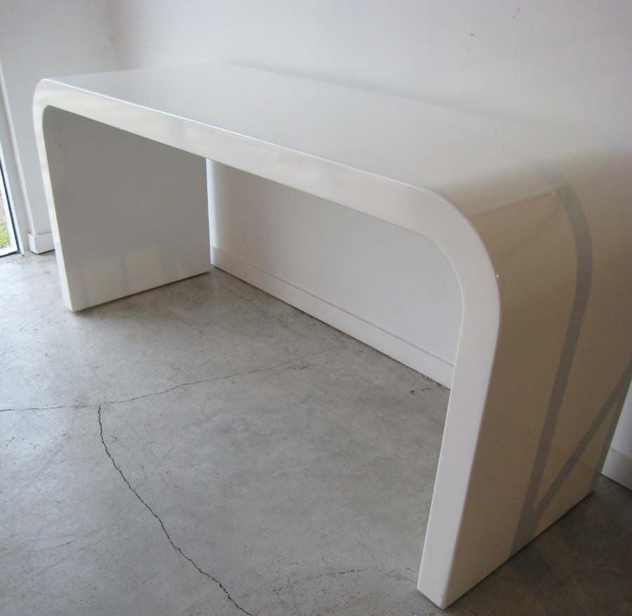 white waterfall console table