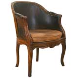 Louis XV Period Walnut, Caned, and Leather Upholstered Bergere