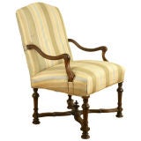 LXIV to LXV Provincial Carved Walnut and Upholsterd Fauteuil