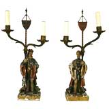 A Pair of Finely Carved Polychrome Painted Figural Lamps