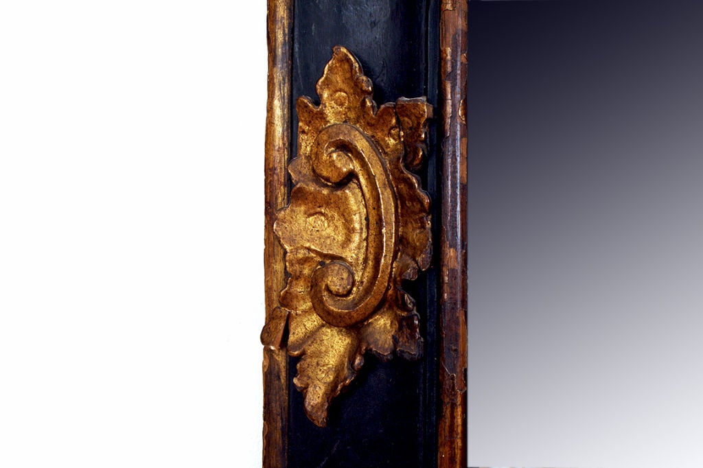 18th Century and Earlier Spanish Baroque Carved Pinewood, Ebonized, and Giltwood Mirror