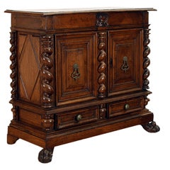 An Italian Late Louis XIV and later Walnut Credenza