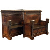 A Pair of Italian Renaissance Revival Carved Oak Hall Benches