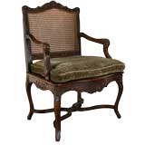 French Regence Period Dark Oak Caned Fauteuil