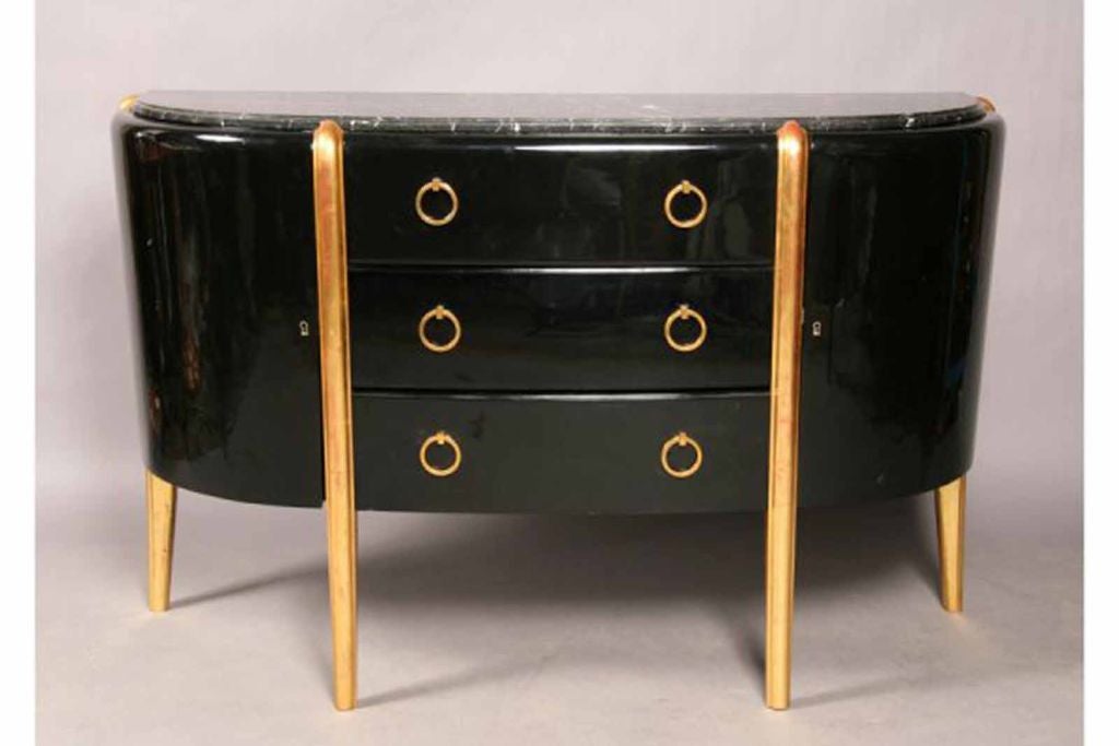 Art Deco demilune commode by Michel Dufet inspired by Louis XVI formality and elegance. Note the graceful curved and attenuated gilt legs protruding over the edge to the inset marble top. The pair of bowed cupboards flank three graduated drawers