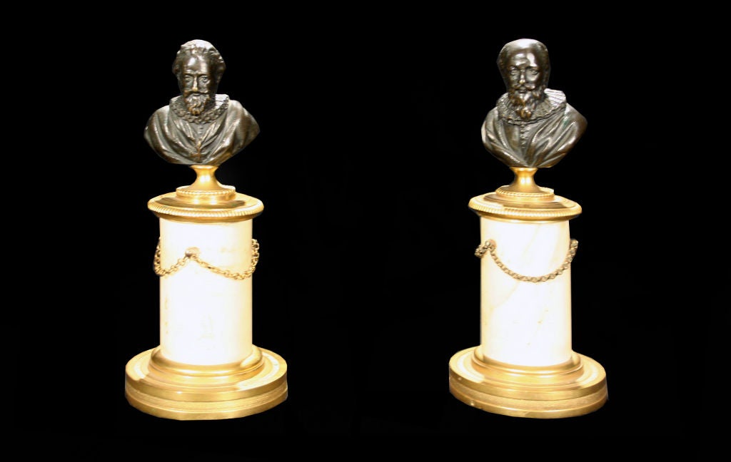 # S084 - Pair of bronze busts each expertly modeled as a 16th century gentleman and raised on white marble pedestals with gilt chain swags and stepped bases.
French, 19th century.

See similar examples of accessories, boxes and decorative objects