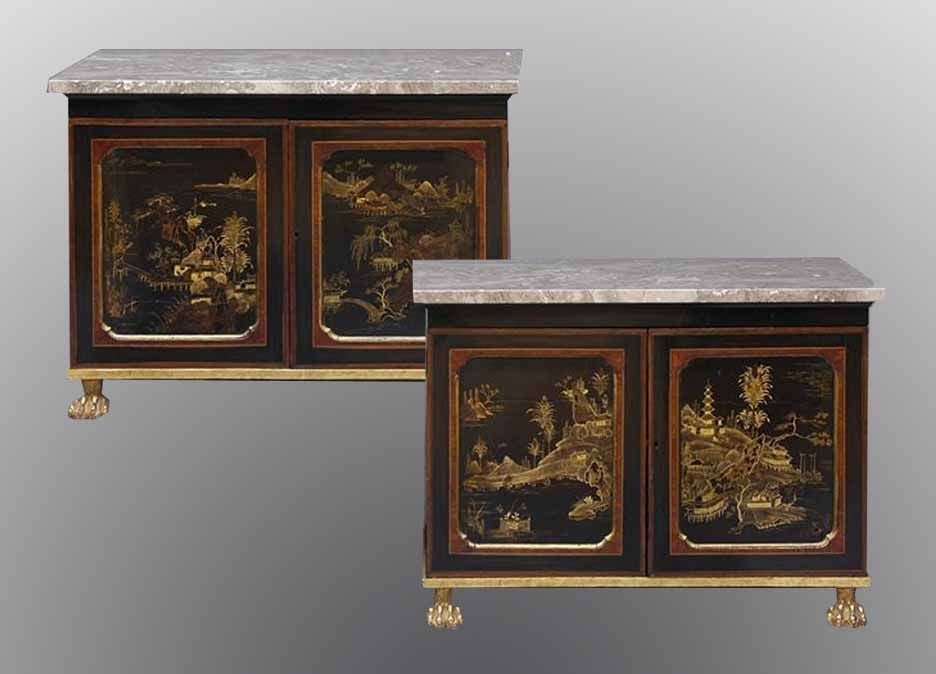 PAIR Regency -Style giltwood and lacquer cabinets<br />
The rectangular mottled buff marble top above a pair of paneled doors centering late 18th chinoiserie panels. The lacquer enriched with gilding, depicting classical garden scenes, within gilt
