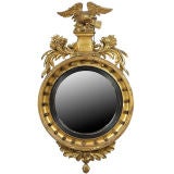 Regency Carved Giltwood And Ebonized Glass Mirror