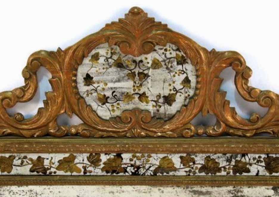 French Gilt and Eglomise Jansen Mirror. Mid 20th Century