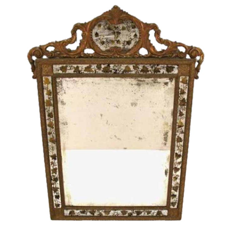 Gilt and Eglomise Jansen Mirror. Mid 20th Century