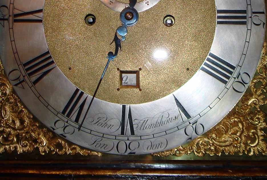 Early Georgian green lacquered and gilt japanned tall case clock by John Monkhouse. Note the decorative effect produced by the chinoiserie decoration, rich with intricate border motifs as well as two stunning landscape scenes including a dramatic