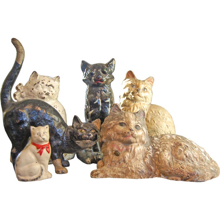 Set of six cast iron cats For Sale