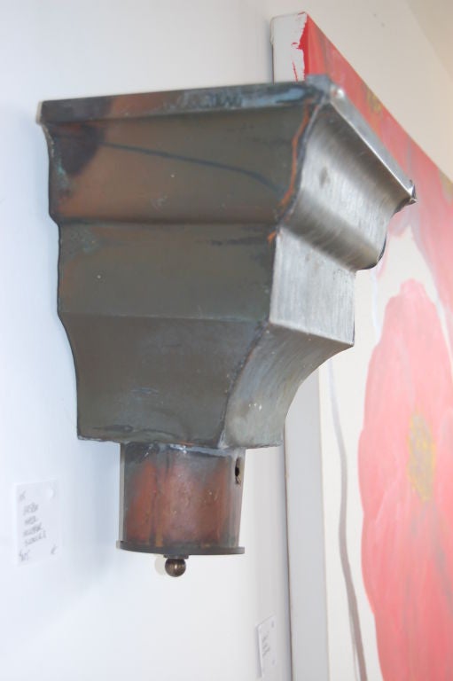 Copper scupper sconces