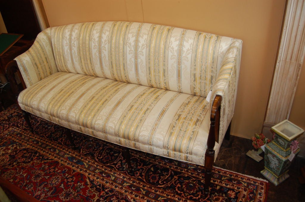 A beautiful Sheraton  Salem inlaid sofa upholstered in a lovely stripe fabric.