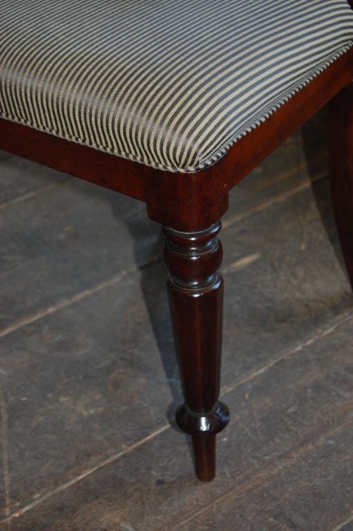 set of four dining chairs