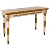 A Florentine Creme Painted and Parcel Gilt Console Table