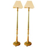 A Pair of Polychrome and Gilt Standing Lamps