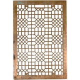 A bronze geometric grille