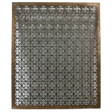 A bronze quatrefoil grille