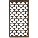 A blackened cast iron fishscale pattern grille