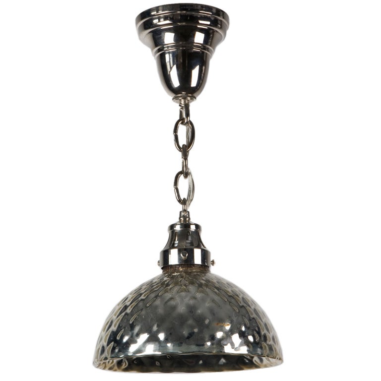 A quilted mercury glass pendant