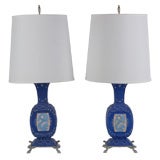 A pair of sea dragon motif blue ceramic table lamps