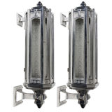 Vintage A pair of polished aluminum wall lanterns