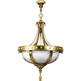 A large partial-gilt bronze inverted dome chandelier