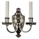 A two arm silver sconce by E. F. Caldwell