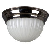 A cast ribbed glass flushmount with polished nickel ring