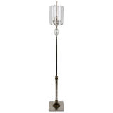 A silverplate floor lamp with wheel cut shade