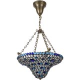 A polychrome glass inverted dome chandelier
