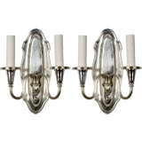 A pair of two arm silverplate sconces