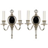 Antique A pair of two arm mirrored sconces