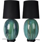 A pair of green ceramic table lamps