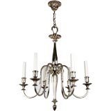 A six arm silverplated chandelier by the maker E. F. Caldwell