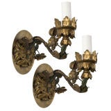 A pair of foliate sconces by the E. F. Caldwell Co.