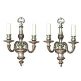 A pair of two-arm sconces by the E. F. Caldwell Co.