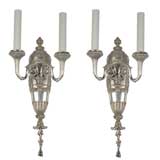 A pair of neoclassical silverplate sconces