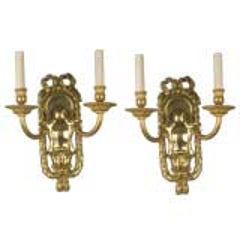 A pair of two-arm sconces by the E. F. Caldwell Co. 10