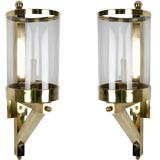 A large pair of cylindrical brass wall lanterns