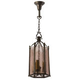 Hexagonal lantern with amethyst colored mottled glass