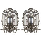 A pair of solid silver double light english sconces