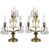 Antique A pair of polished brass and crystal table lamps
