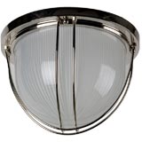 A prismatic glass and nickel flushmount fixture