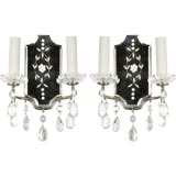 A pair of two arm crystal and mirror sconces