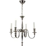 A four-arm nickel baluster-form chandelier