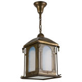 Antique A four sided brass lantern with opaline glass and a m