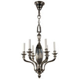 A six-arm nickeled bronze chandelier