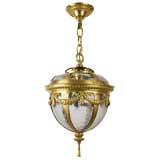 An E. F. Caldwell gilt brass and glass lantern